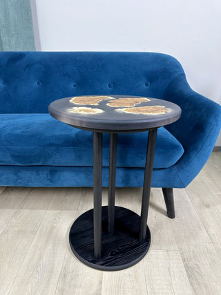 Black round epoxy side table