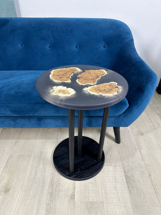 Black round epoxy side table