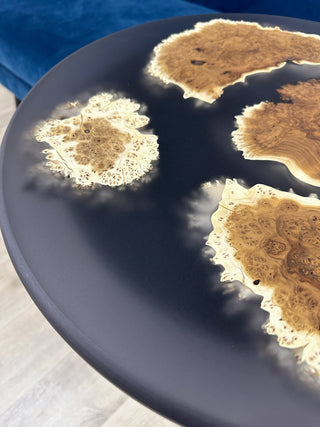 Black round epoxy side table