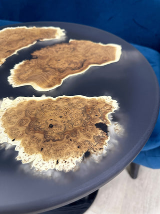 Black round epoxy side table