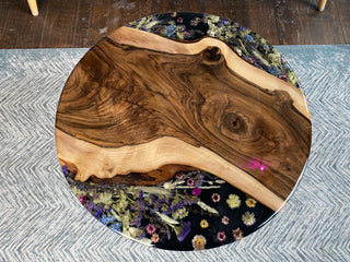 Round wood epoxy coffee table with pressed flowers