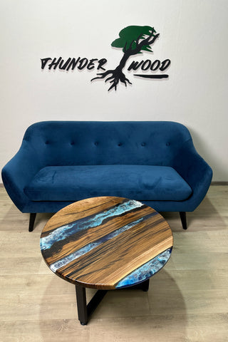 Runder Ocean Art Couchtisch aus Walnussholz