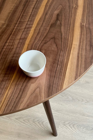 Round black walnut dining table