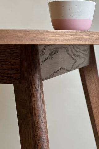 Round black walnut dining table