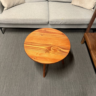 Round walnut color wood coffee table