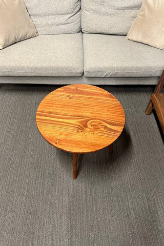 Round walnut color wood coffee table