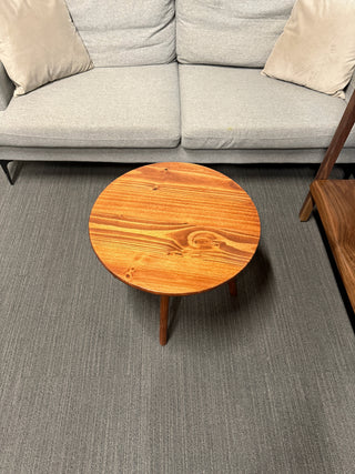 Round walnut color wood coffee table