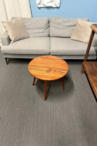 Round walnut color wood coffee table