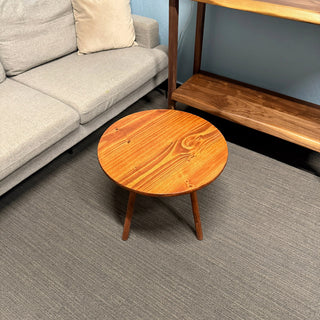Round walnut color wood coffee table