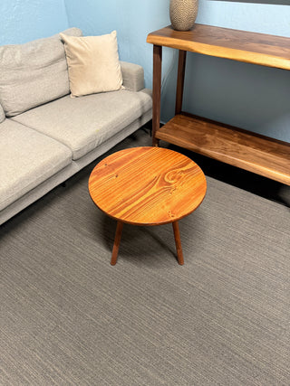 Round walnut color wood coffee table