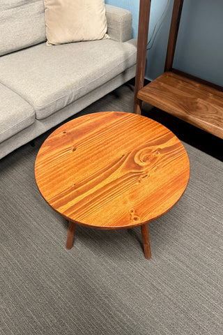 Round walnut color wood coffee table