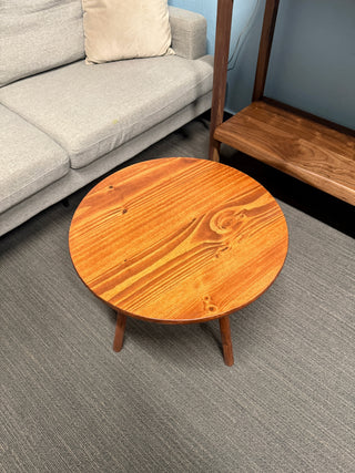 Round walnut color wood coffee table