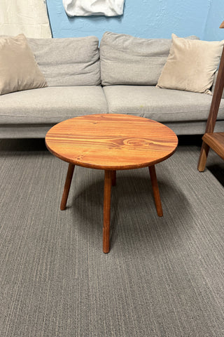 Round walnut color wood coffee table
