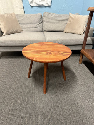 Round walnut color wood coffee table