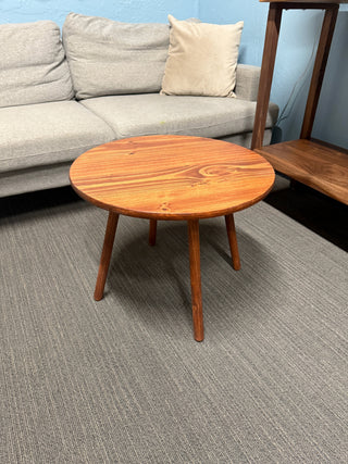 Round walnut color wood coffee table