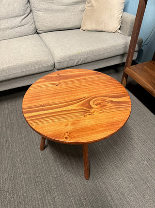 Round walnut color wood coffee table