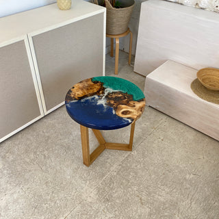 Runder Couchtisch aus Kunstharz mit Ozeanmotiv