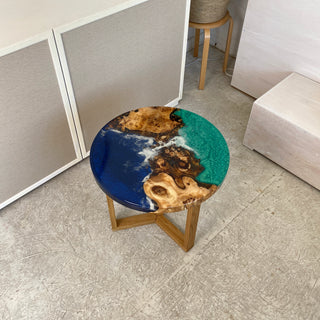 Runder Couchtisch aus Kunstharz mit Ozeanmotiv