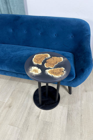 Black round epoxy side table