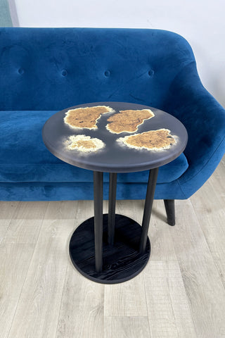 Black round epoxy side table
