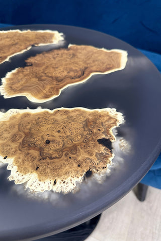Black round epoxy side table